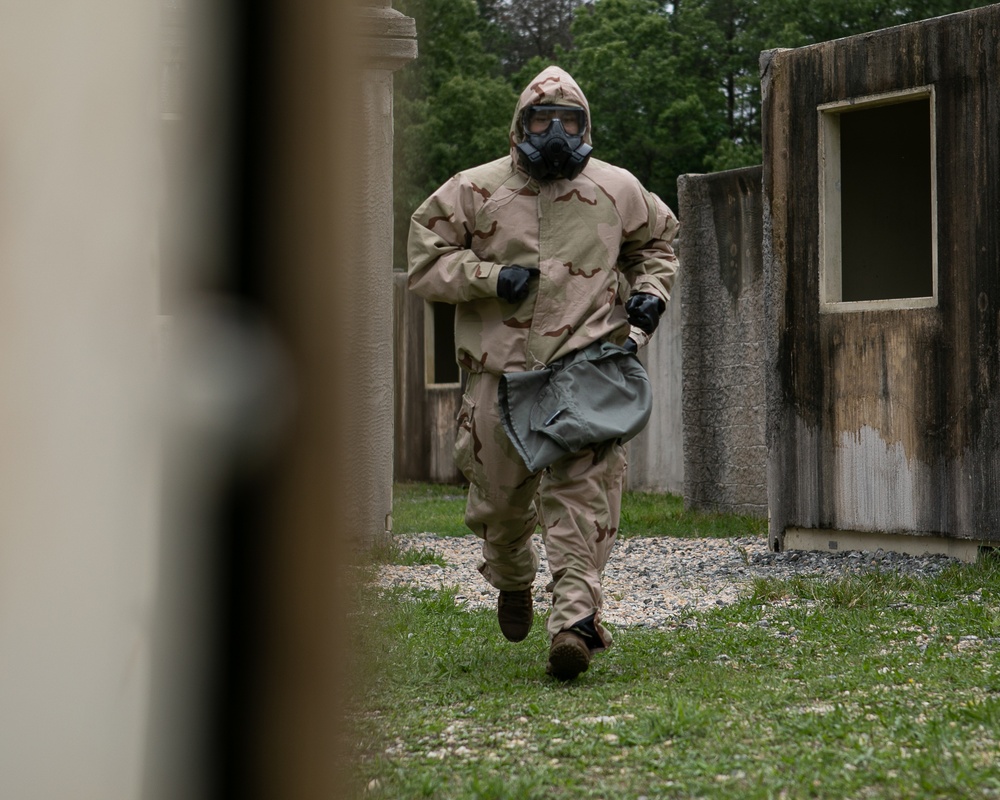 Participants of the 11th Annual Best Combat Camera Competition prepare to compete in an event.