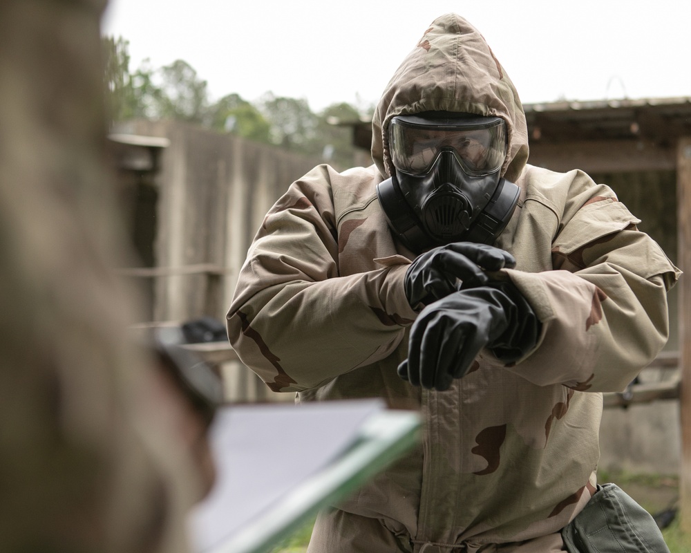 Participants of the 11th Annual Best Combat Camera Competition prepare to compete in an event.