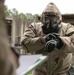 Participants of the 11th Annual Best Combat Camera Competition prepare to compete in an event.