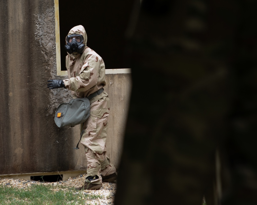 Participants of the 11th Annual Best Combat Camera Competition prepare to compete in an event.