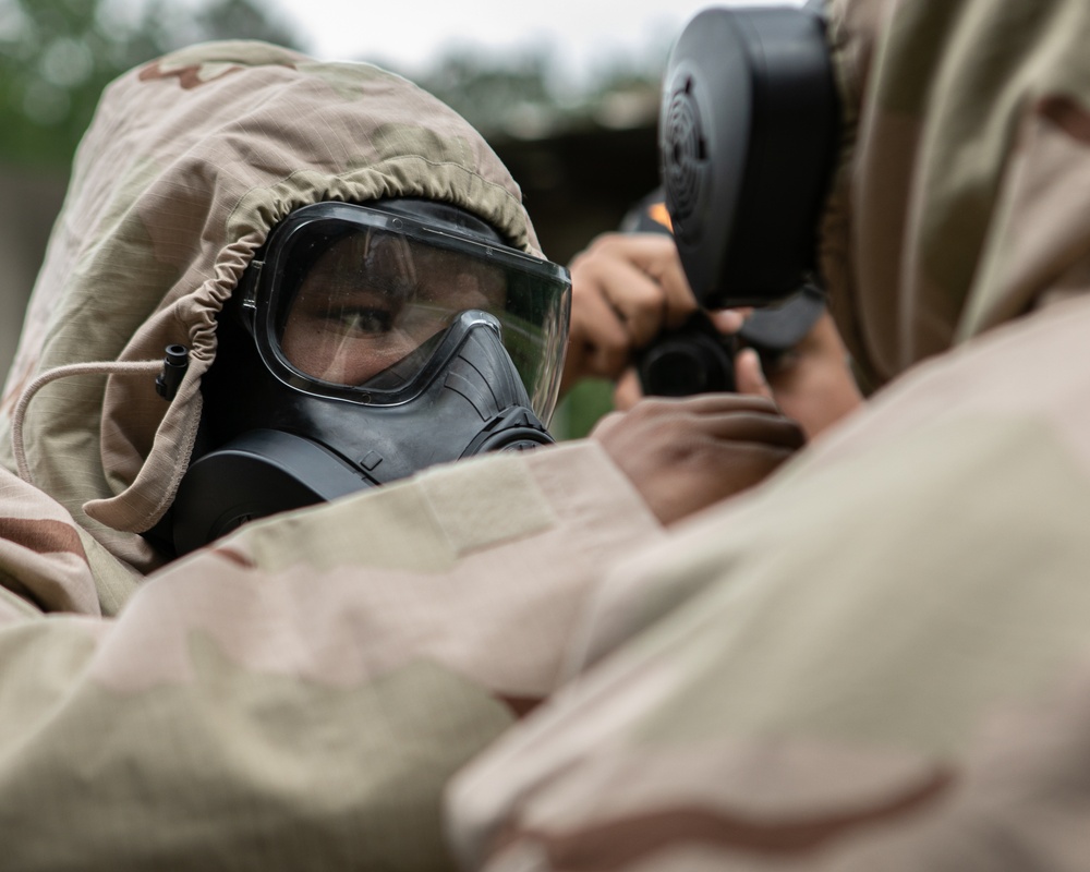 Participants of the 11th Annual Best Combat Camera Competition prepare to compete in an event.