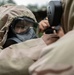 Participants of the 11th Annual Best Combat Camera Competition prepare to compete in an event.