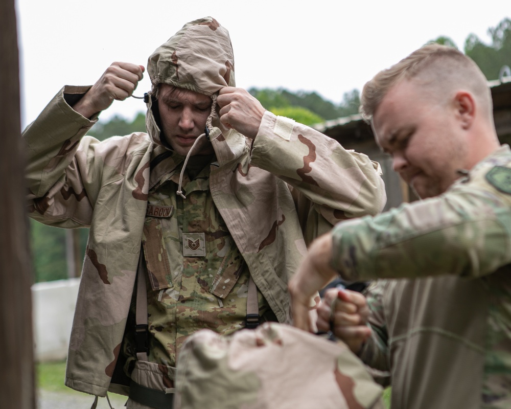 Participants of the 11th Annual Best Combat Camera Competition prepare to compete in an event.