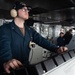 USS Ronald Reagan (CVN 76) Sailors stand watch in the pilot house
