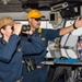 USS Ronald Reagan (CVN 76) Sailors stand watch in the pilot house