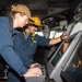 USS Ronald Reagan (CVN 76) Sailors stand watch in the pilot house