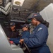 USS Ronald Reagan (CVN 76) Sailors stand watch in the pilot house