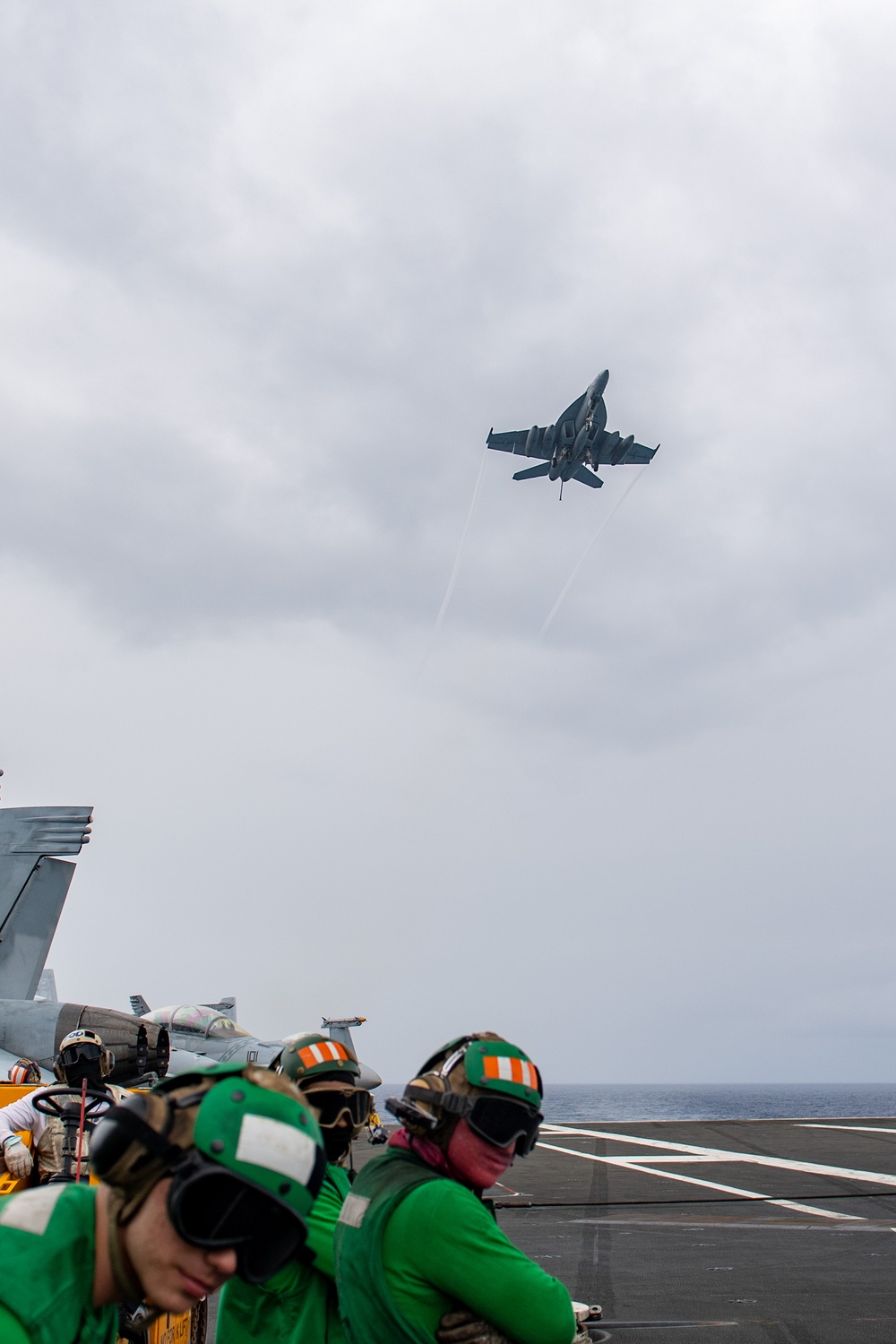 USS Ronald Reagan (CVN 76) Sailors conduct flight deck operations USS Ronald Reagan (CVN 76) Sailors conduct flight deck operations