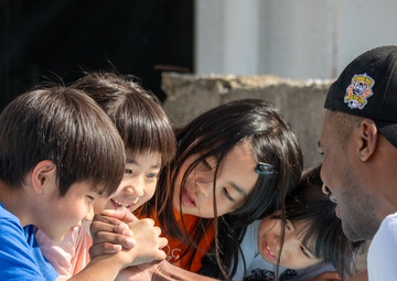 Arm wrestling with soldier