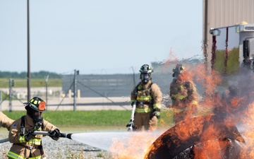 Feel the heat: Firefighters battle flames during training