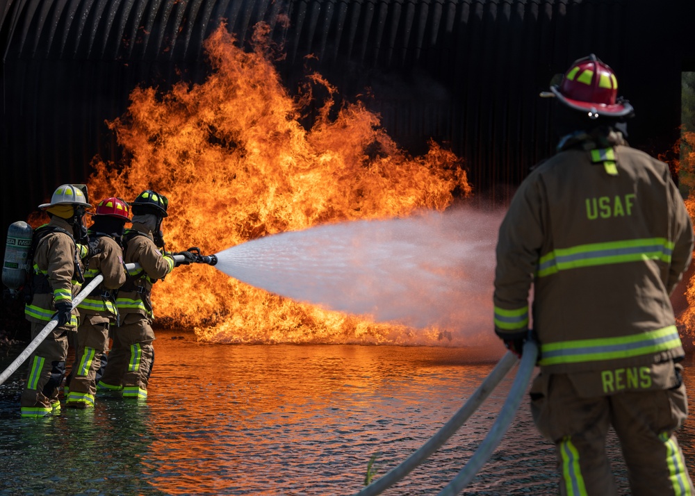 Feel the heat: Firefighters battle flames during training