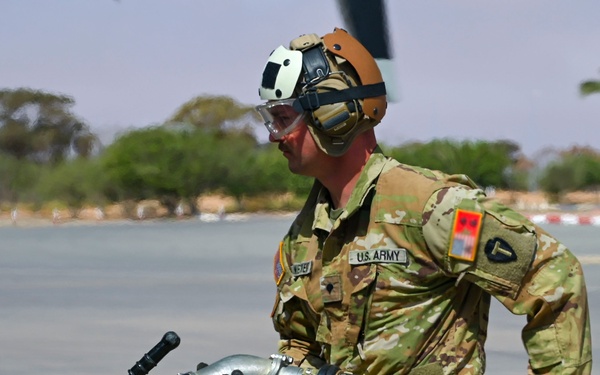 Loadmasters hot-pit refuel at African Lion 24