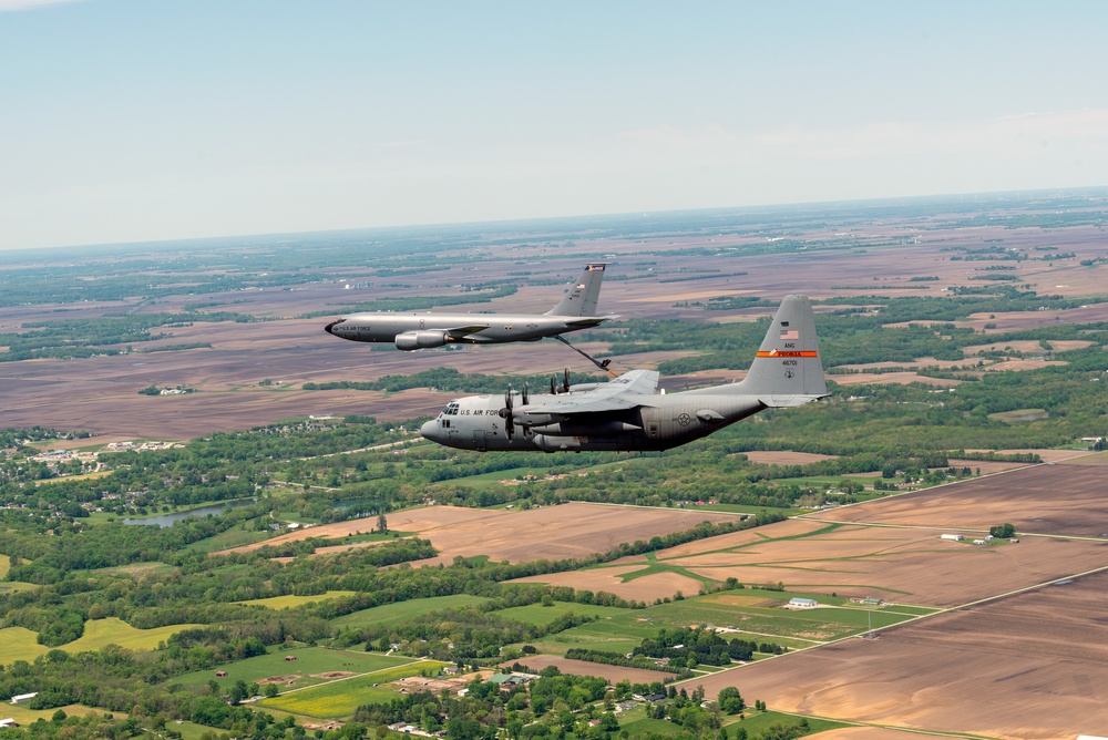 Illinois Air National Guard C-130H Hercules and KC-135R Stratotanker fly over Springfield, Ill., May 1, 2024