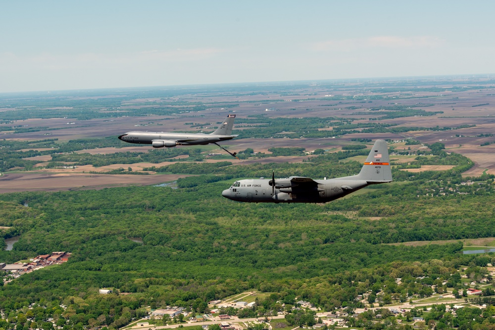 Illinois Air National Guard C-130H Hercules and KC-135R Stratotanker fly over Springfield, Ill., May 1, 2024