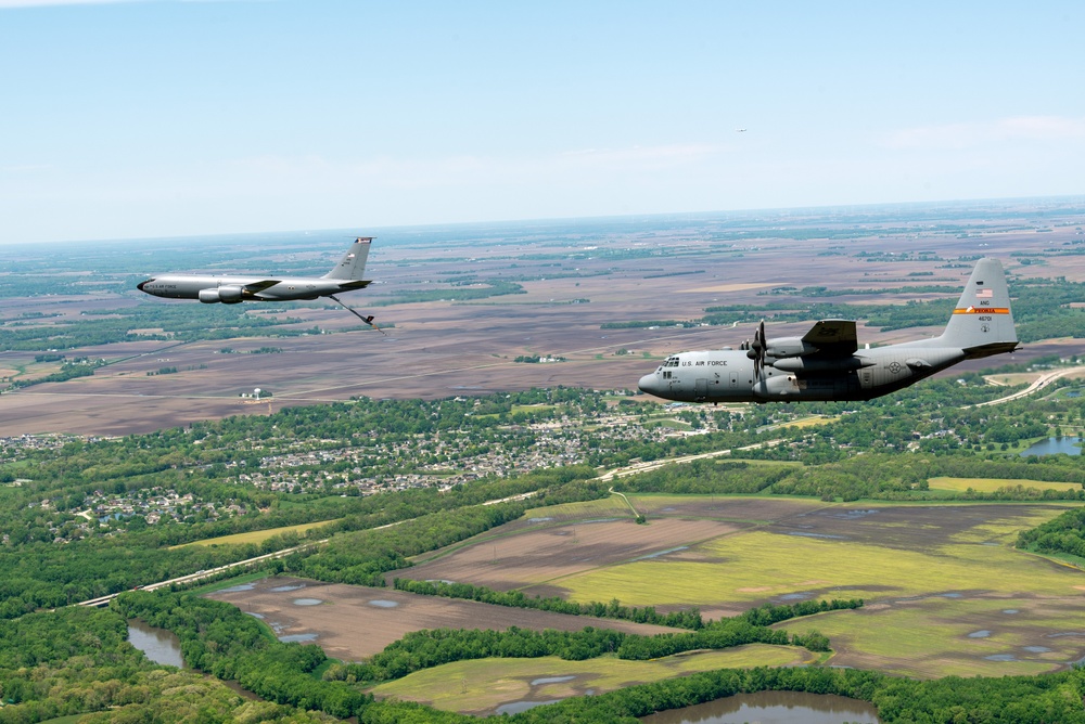 Illinois Air National Guard C-130H Hercules and KC-135R Stratotanker fly over Springfield, Ill., May 1, 2024