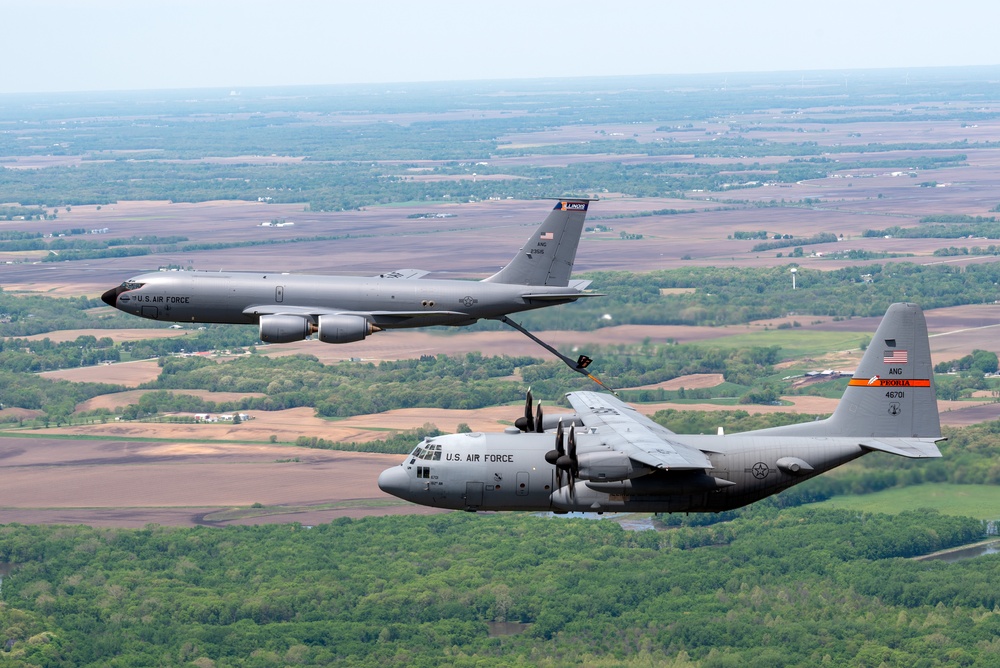 Illinois Air National Guard C-130H Hercules and KC-135R Stratotanker fly over Springfield, Ill., May 1, 2024