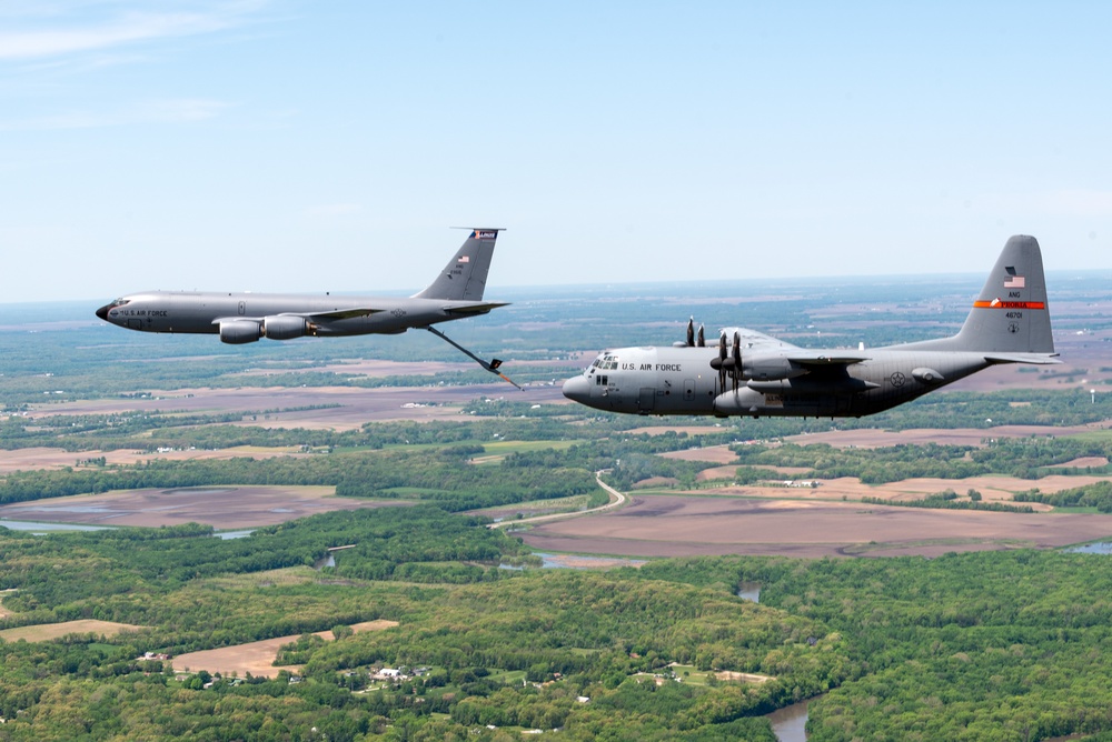 Illinois Air National Guard C-130H Hercules and KC-135R Stratotanker fly over Springfield, Ill., May 1, 2024
