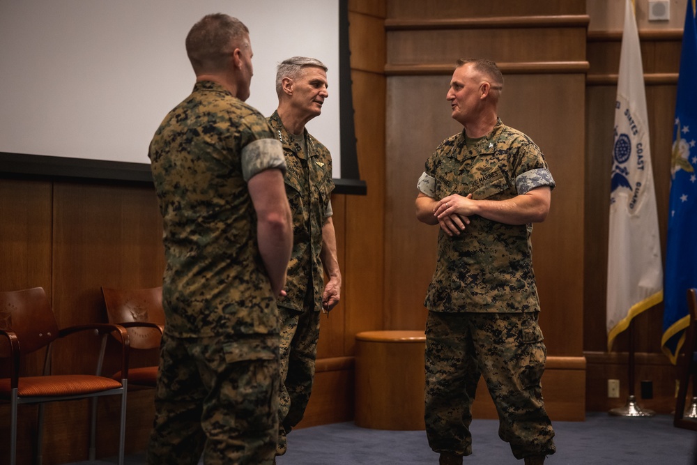 U.S. Marines with MCOTEA host a change of command ceremony