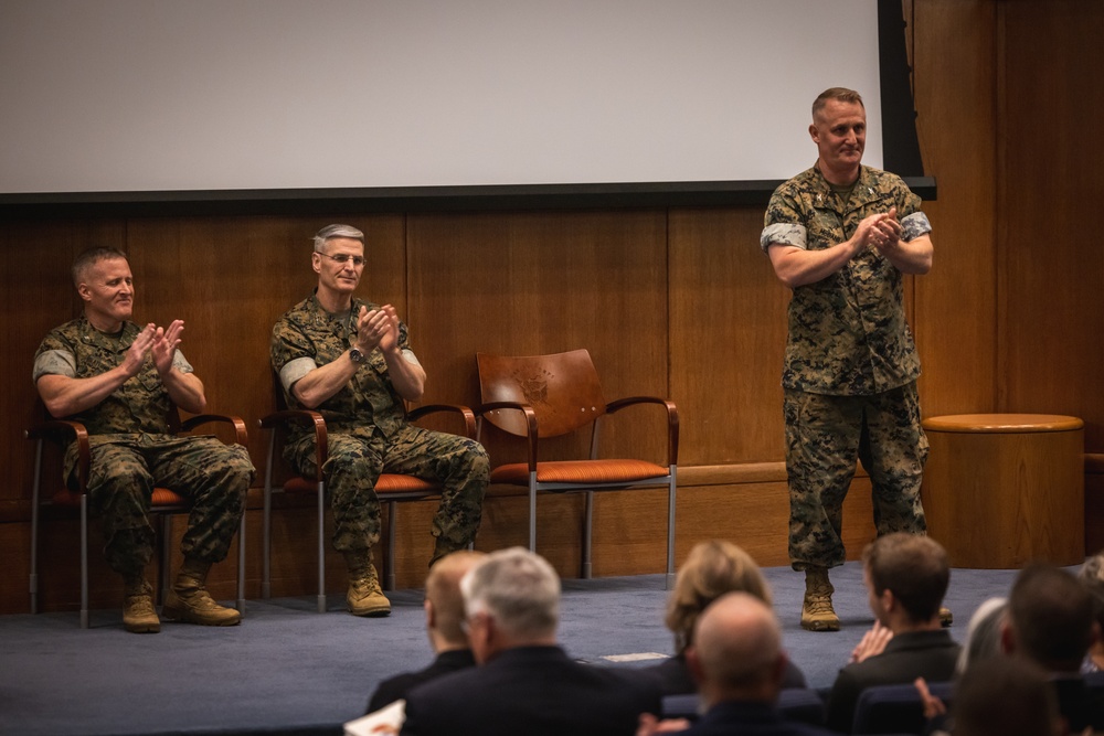 U.S. Marines with MCOTEA host a change of command ceremony
