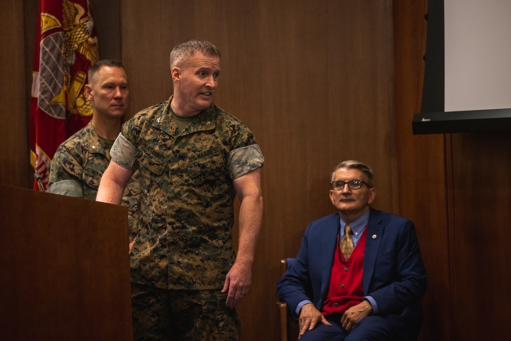 U.S. Marines with MCOTEA host a change of command ceremony