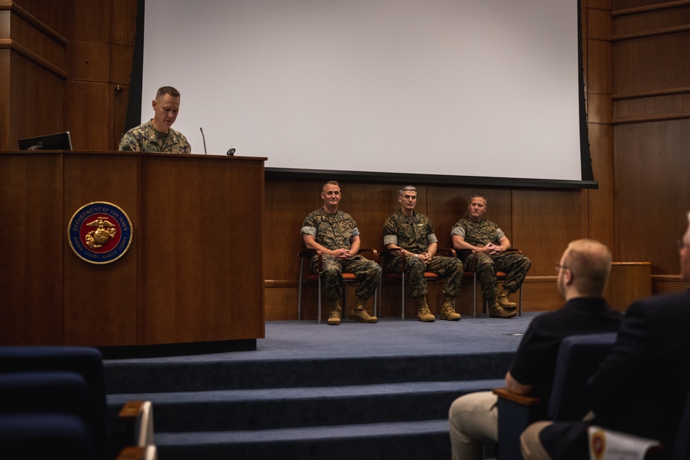 U.S. Marines with MCOTEA host a change of command ceremony