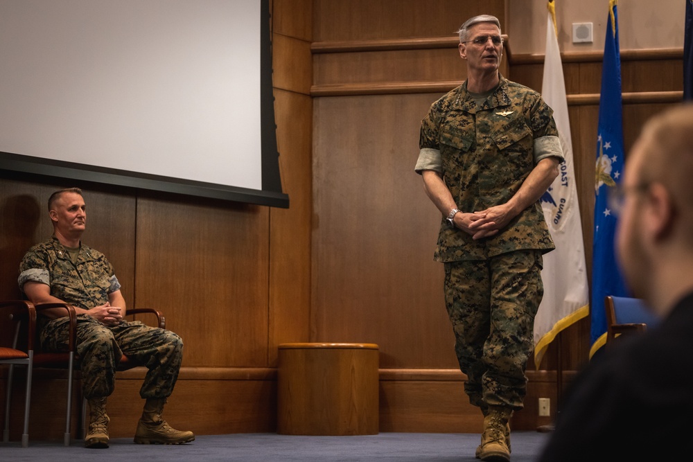 U.S. Marines with MCOTEA host a change of command ceremony