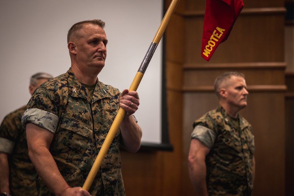U.S. Marines with MCOTEA host a change of command ceremony