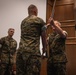 U.S. Marines with MCOTEA host a change of command ceremony