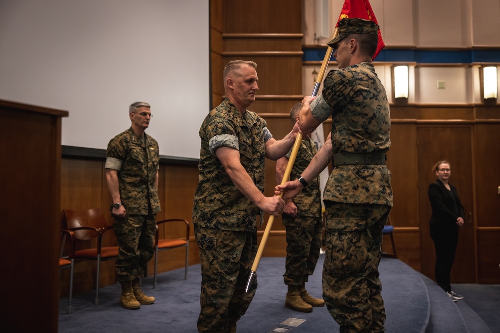 U.S. Marines with MCOTEA host a change of command ceremony