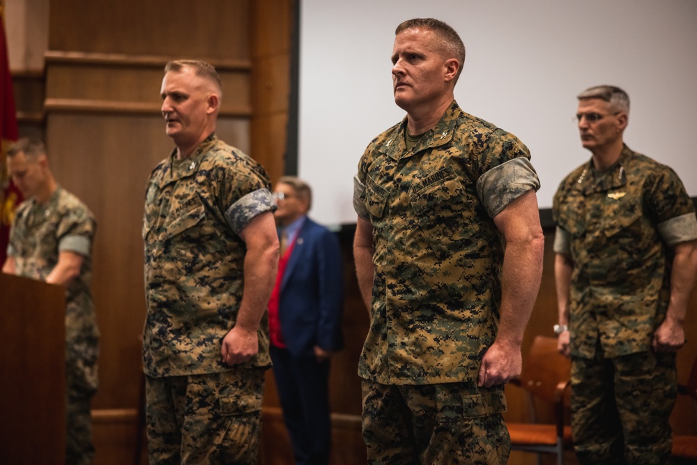 U.S. Marines with MCOTEA host a change of command ceremony