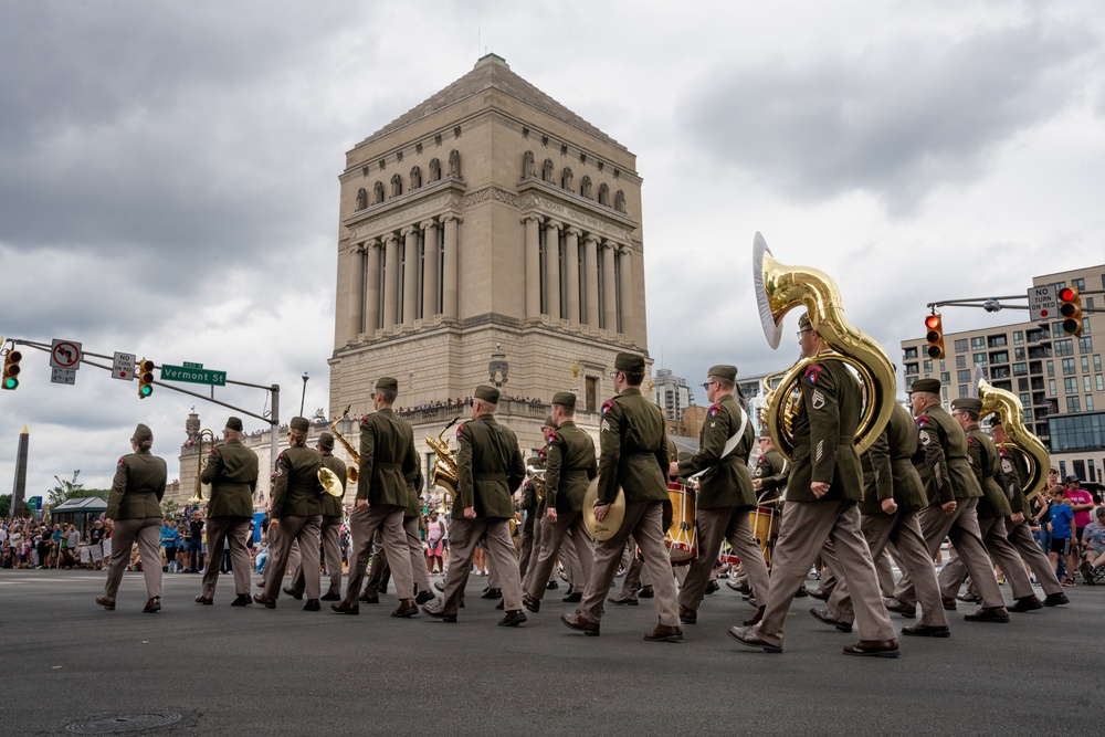 Hoosier National Guardsmen march alongside racers during the 500 Festival Parade