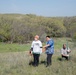 Omaha District partners with WOZU group to plant native vegetation near Standing Rock bike trails