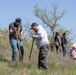 Omaha District partners with WOZU group to plant native vegetation near Standing Rock bike trails