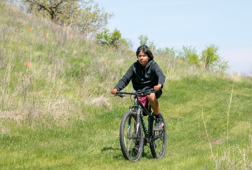 Omaha District partners with WOZU group to plant native vegetation near Standing Rock bike trails