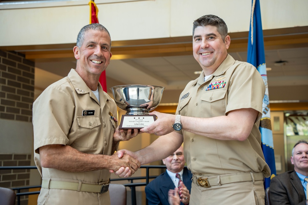 Desmond accepts NAVAIR Commander's Award