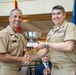 Desmond accepts NAVAIR Commander's Award