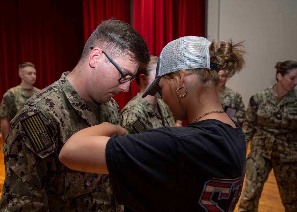 NIOC Texas Frocks More Than 80 Sailors