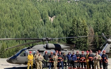 Guard Aviation trains with Fire and Rescue crews to build familiarization during rescue operations