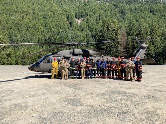 Guard Aviation trains with Fire and Rescue crews to build familiarization during rescue operations