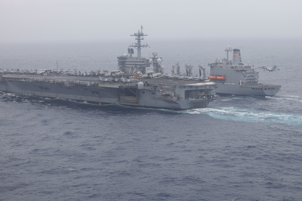 Abraham Lincoln conducts flight operations during a replenishment at sea
