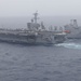 Abraham Lincoln conducts flight operations during a replenishment at sea