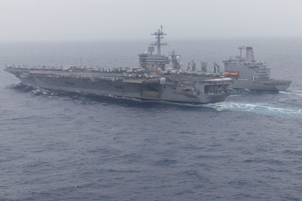Abraham Lincoln conducts flight operations during a replenishment at sea
