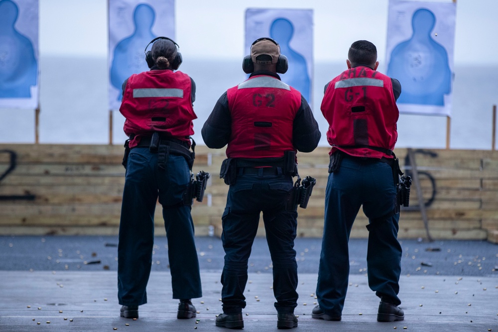 USS Tripoli Sailors participate in a gun shoot