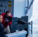 USS Tripoli Sailor practice with the M240B