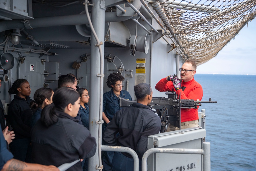 USS Tripoli Sailor practice with the M240B