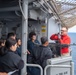 USS Tripoli Sailor practice with the M240B