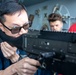 USS Tripoli Sailor practice with the M240B