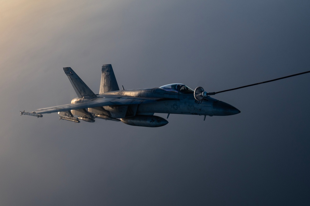 KC-135 refuels U.S. Navy Fighters in U.S. Central Command