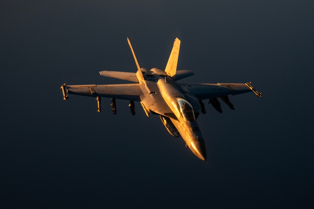 KC-135 refuels U.S. Navy Fighters in U.S. Central Command