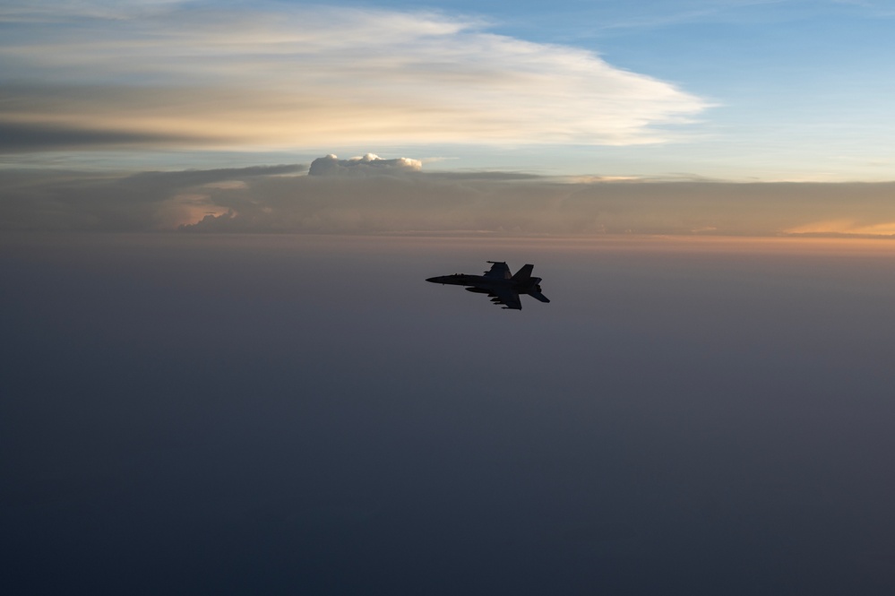 KC-135 refuels U.S. Navy Fighters in U.S. Central Command